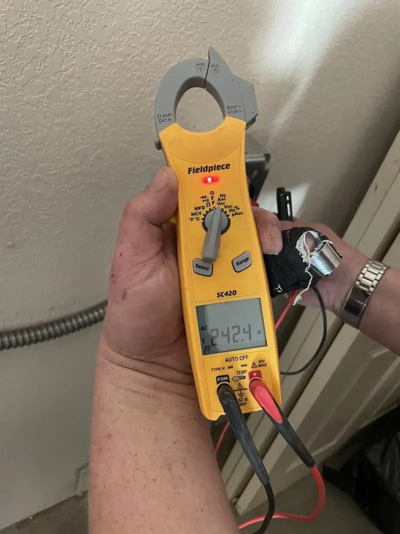 Voltage testing with clamp meter during Generator Installation in Georges